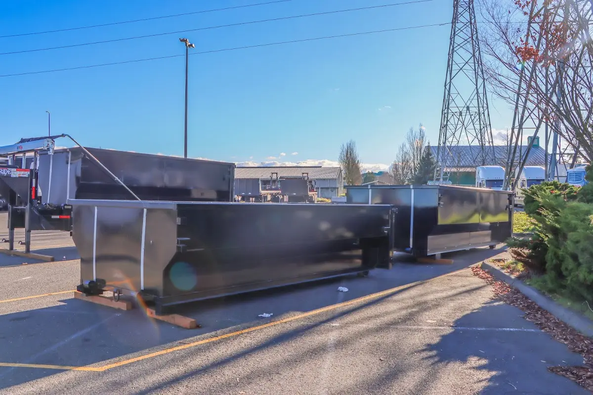 Roll-off dumpster ready for waste disposal at job site for 2 Yard Dumpster Rental in Barnstead